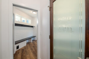 glass door that says Pantry near a hallway