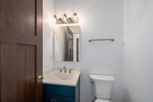 small bathroom with single vanity and toilet